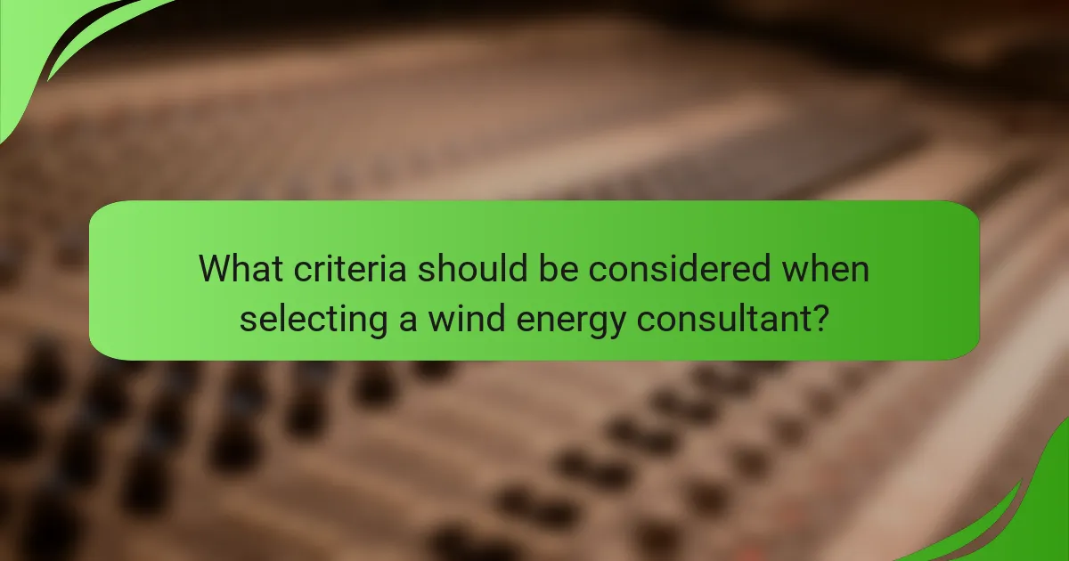 What criteria should be considered when selecting a wind energy consultant?